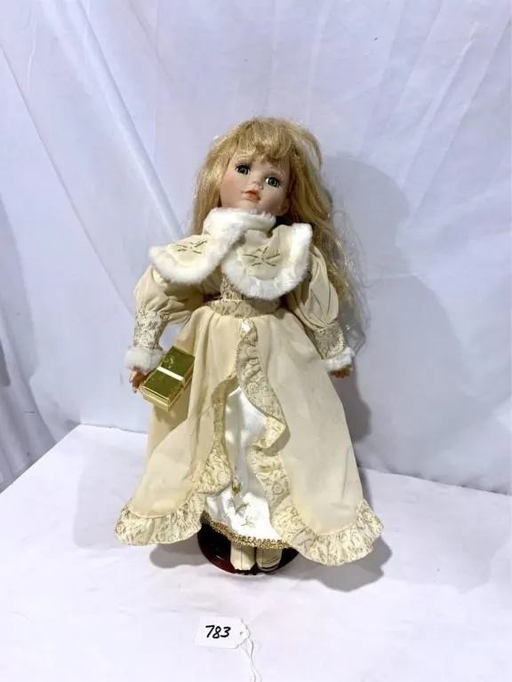 Porcelain doll with Christmas dress