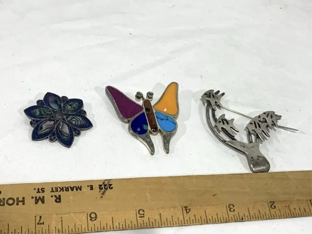 Brooches, marked sterling or 925, wieighs 48.7