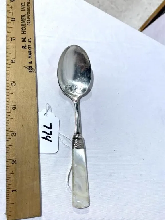 Spoon marked sterling with Mother of Pearly