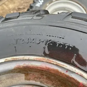 (4) QUAD TIRES ON RIMS