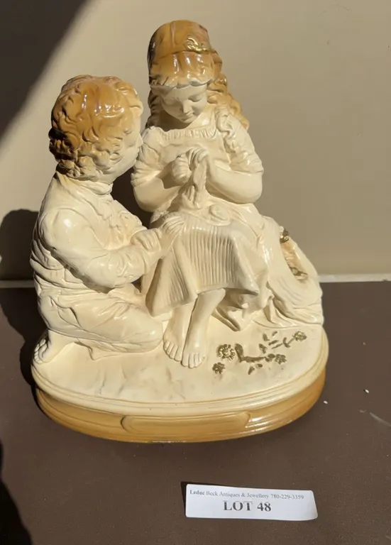 Porcelain Figurine of Children Reading Book