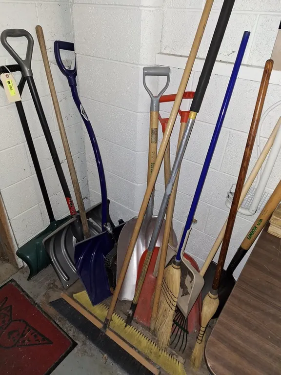 Assorted Shovels and Brooms