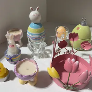Assortment of pastel-colored Easter and spring-themed decor items,
