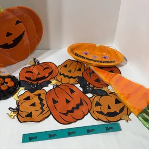 Halloween decor. Includes a stand, scarf, plate, candy dish, and glass gems.
