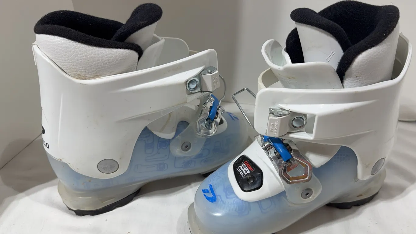 Pair of white and transparent blue Dalbello Gaia 2.0 junior girls' ski boots
