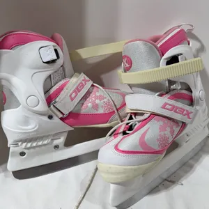 Pair of white and pink DBX adjustable youth ice skates size 3-6