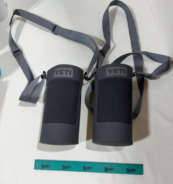 Pair of charcoal grey YETI Rambler Bottle Slings