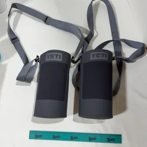 Pair of charcoal grey YETI Rambler Bottle Slings