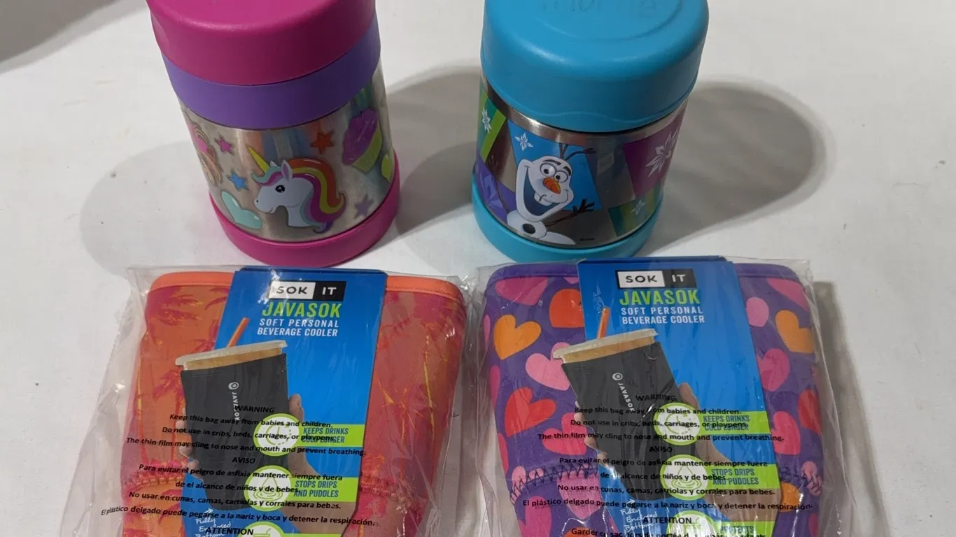 2 Thermos Funtainer vacuum insulated food jars (one pink with a unicorn design and one blue with a F