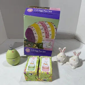 Lot of Easter decor in a 3-D egg pan set