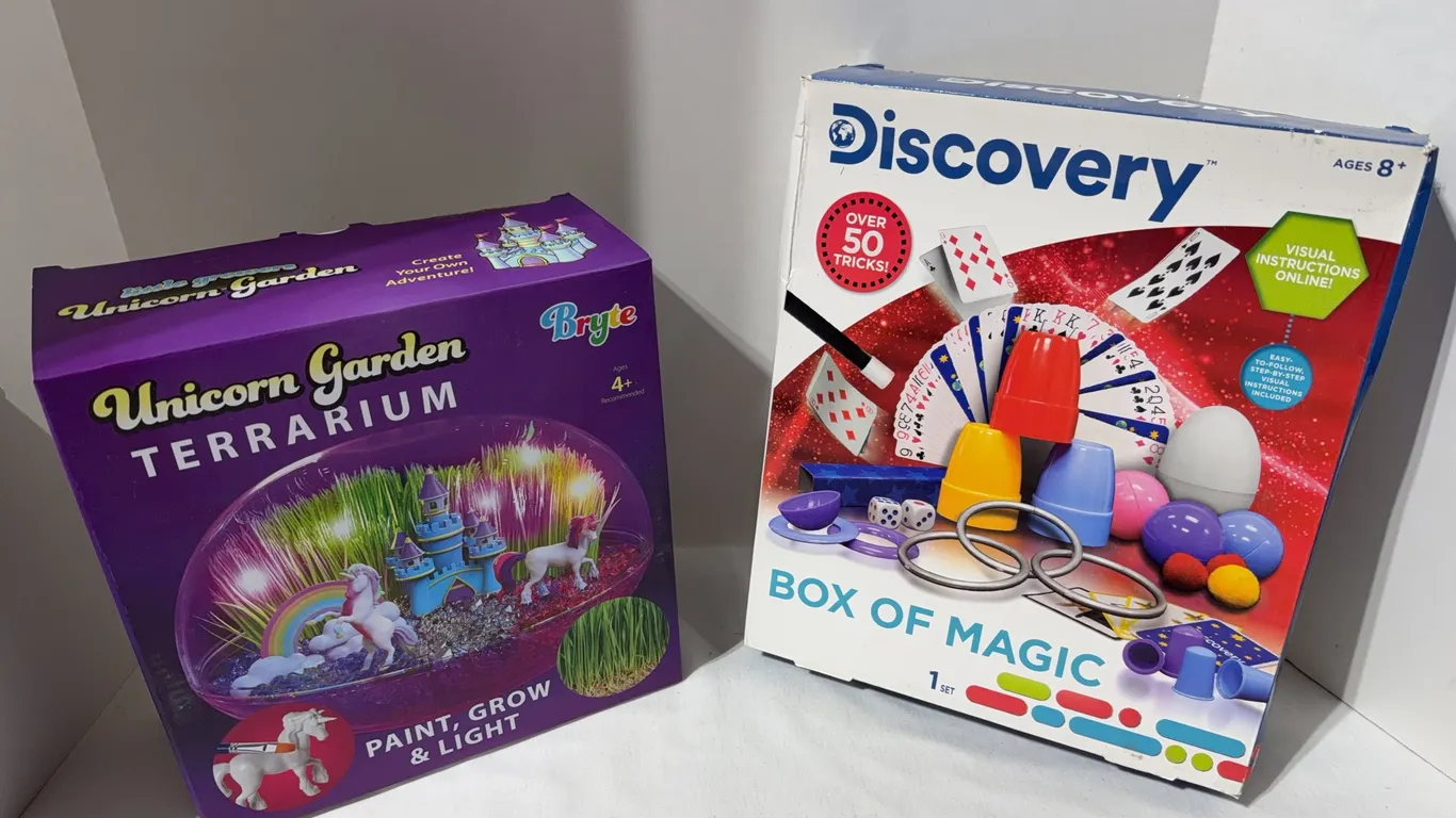 Two kids' activity boxes: a BRYTE Light Up Unicorn Garden Terrarium Kit and a Discovery Box of Magic