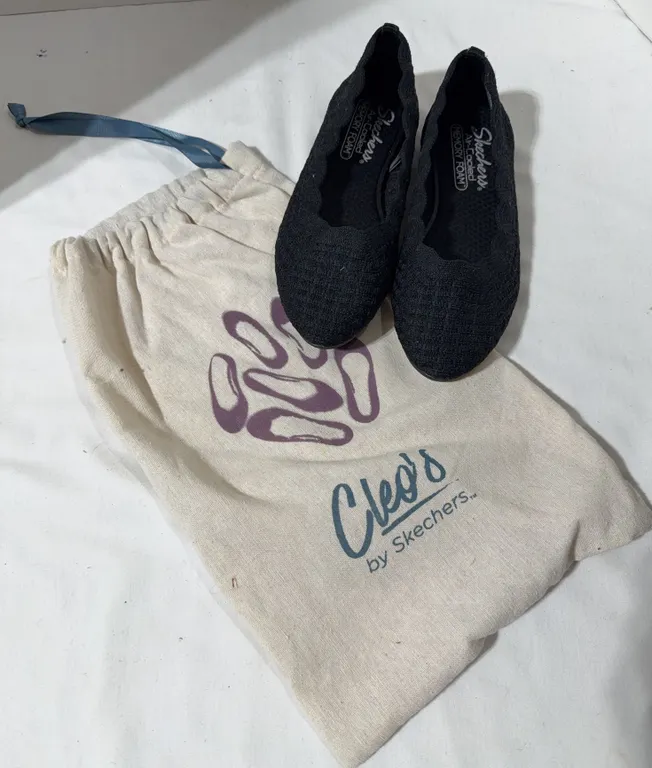 Pair of size 6 black Skechers Cleo knit slip-on flats