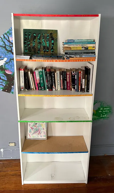 Painted Bookcase With Assorted Books