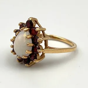 14K Gold Opal Ring with Garnet Halo