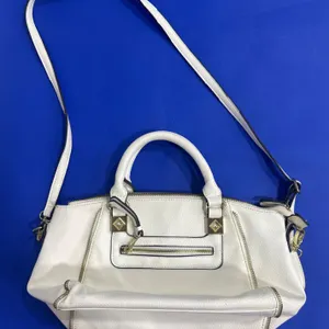 White Handbag with Dual Handles and Shoulder Strap