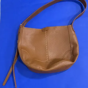 Tan Leather Shoulder Bag With Zippered Interior Compartments