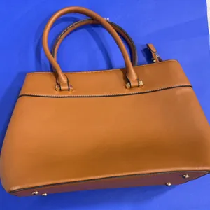 Tan Handbag With Metal Studded Base and Dual Handles