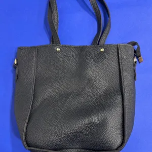 Black Pebble-Textured Handbag with Multiple Accessories