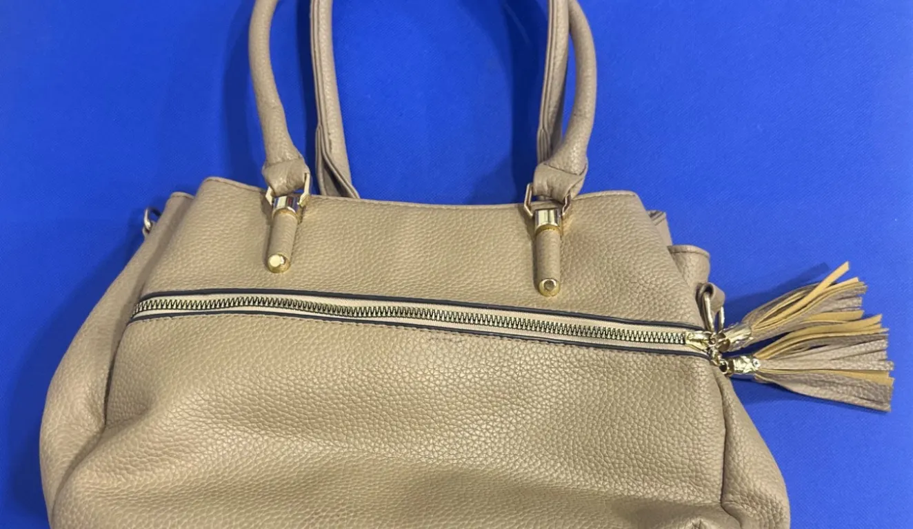 Beige Faux Leather Handbag with Tassel Accent and Dual Handles