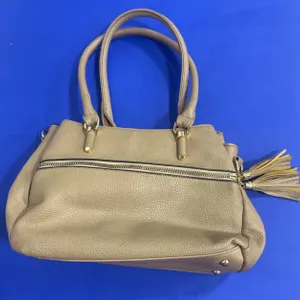 Beige Faux Leather Handbag with Tassel Accent and Dual Handles