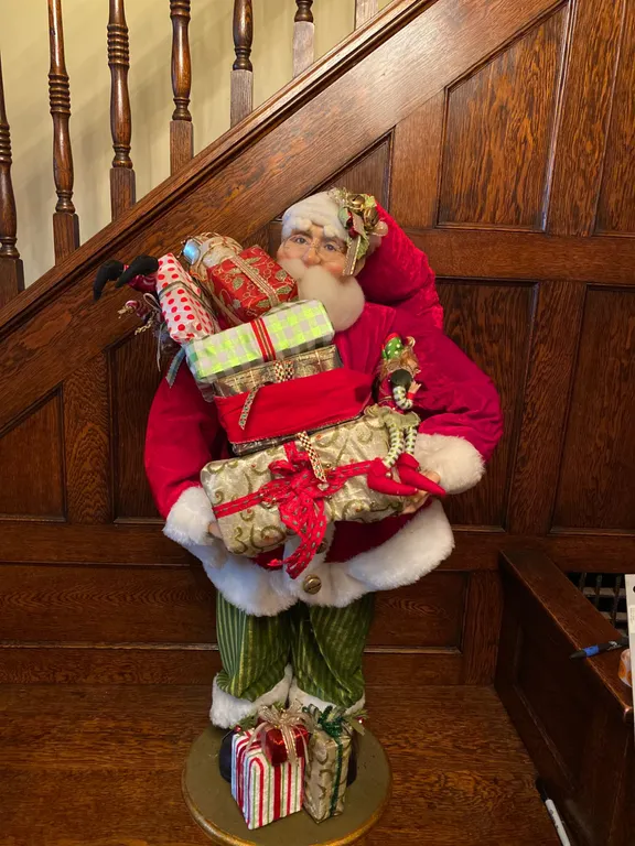 Santa Claus Figurine Holding Gifts