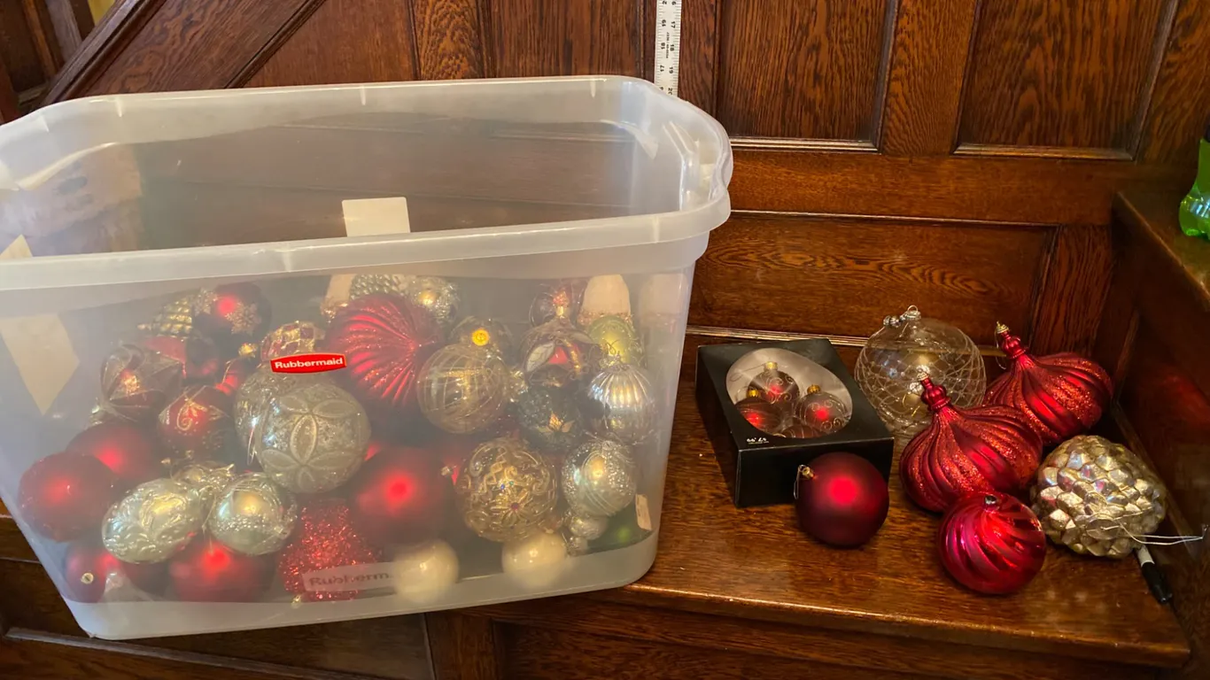 Holiday Ornaments Featuring Red, Gold, and Metallic Tones