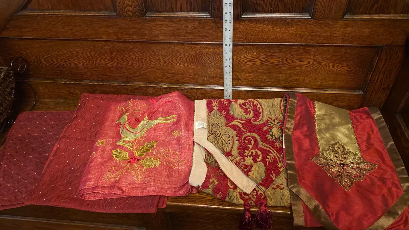 Red and Gold Decorative Textiles With Embroidered Designs