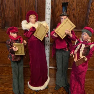 Four Victorian-Style Caroler Figurines in Holiday Attire