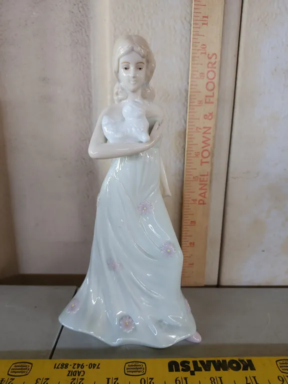 Porcelain Woman Figure Holding Dog 9.5" Tall