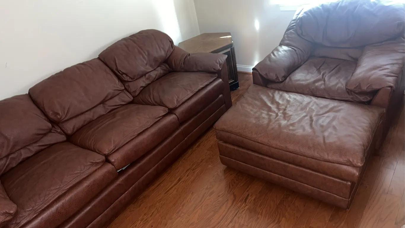 Leather sofa with matching chair and ottoman