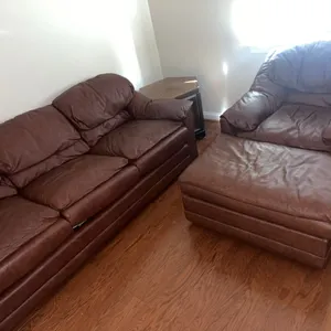 Leather sofa with matching chair and ottoman