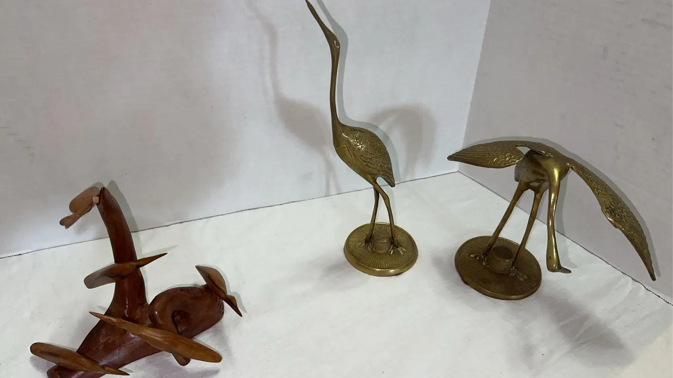 Unique small wood bird sculpture and brass cranes