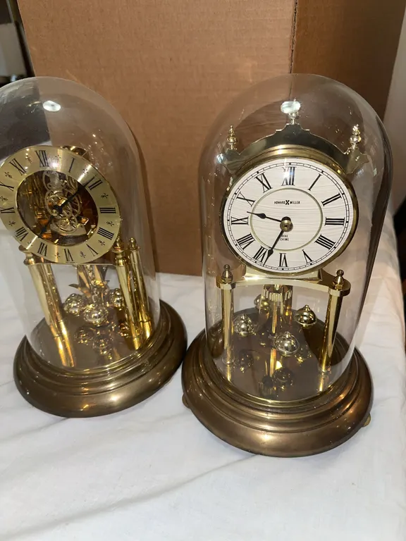 2 anniversary clocks – Howard Miller, etc.