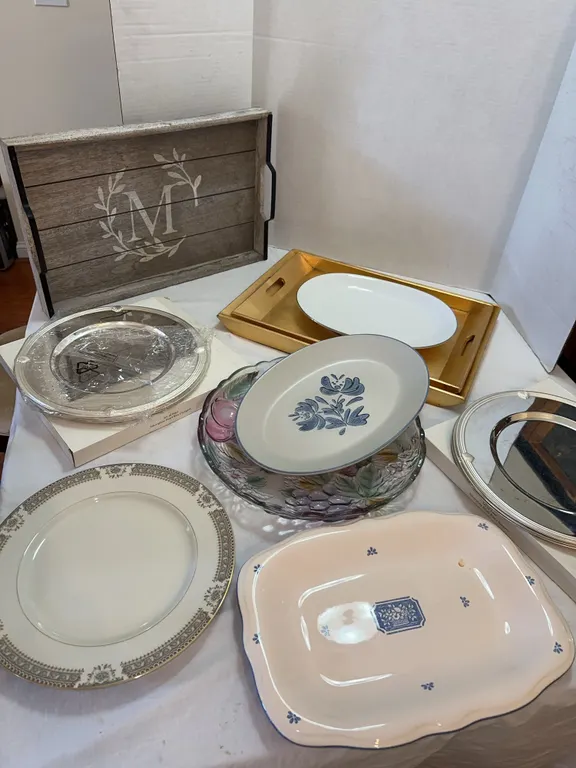 Silverplate chargers, trays and platters