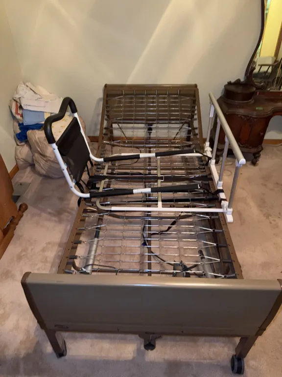 Steel frame bed with sides and electric remote controlled back support with headboards 