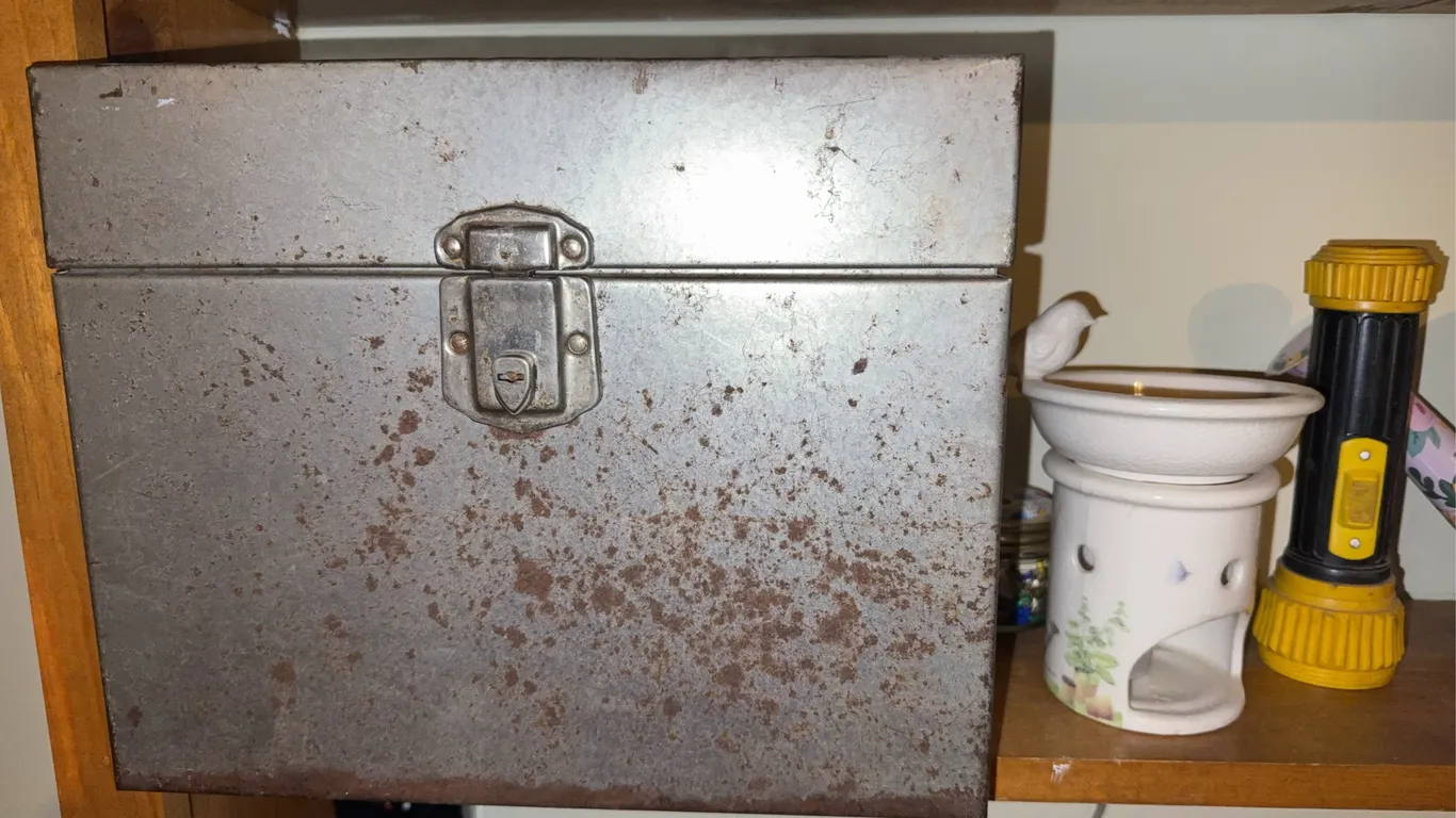 Metal box and water watering can