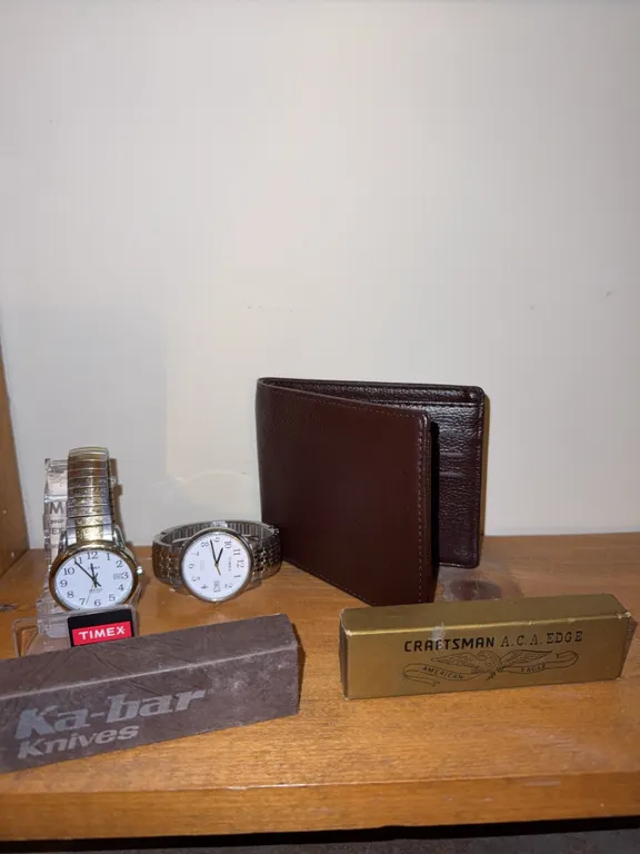 Watches, new wallet, and two knives in box