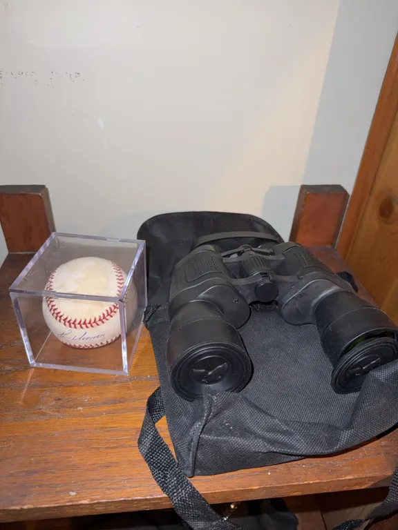 Signed baseball with binoculars