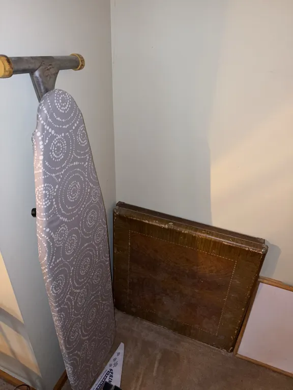 Collapsible card table and ironing board with wooden chair