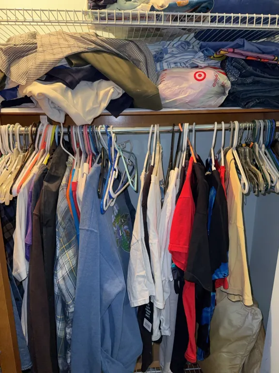 Closet, clean out, clothes, pants, shirts, various sizes, and colors