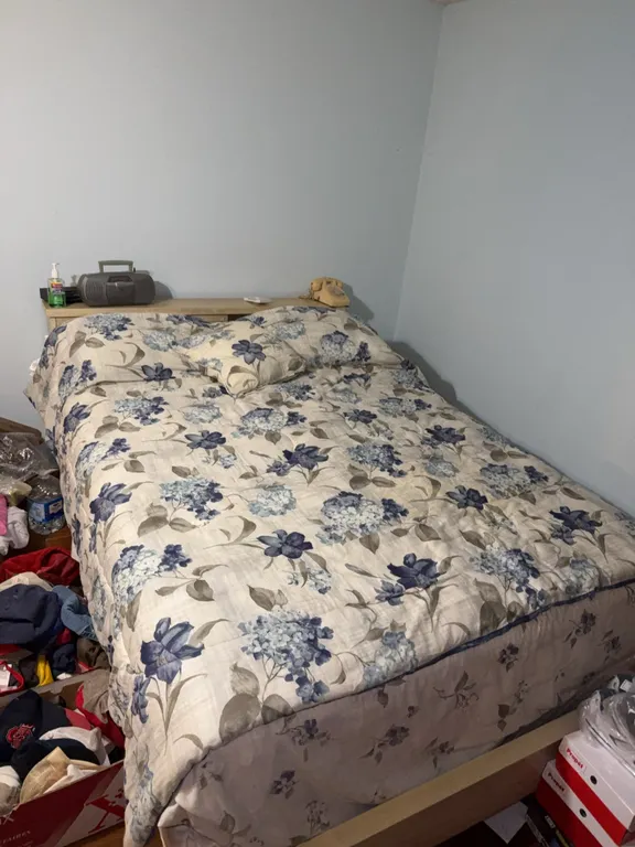 Large bed with bed spread box spring and mattress
