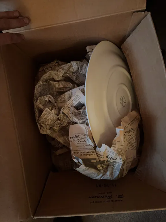 box of assorted fine china