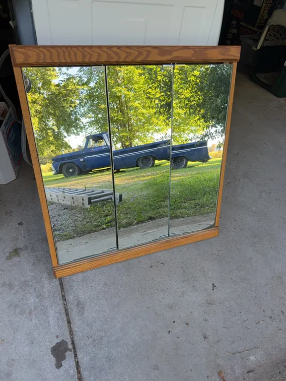 Bathroom mirror with medicine cabinet inside