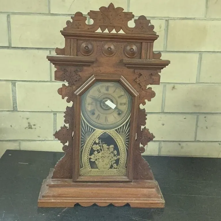 Antique Wooden Mantel Clock with Ornate Carvings