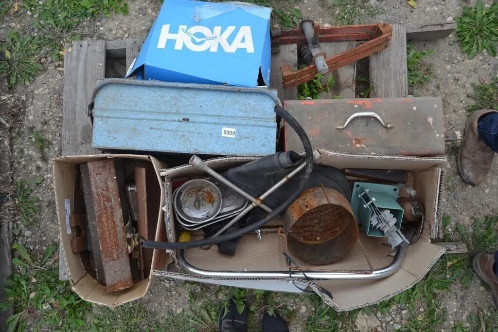 Pallet with assorted tool boxes and tools.