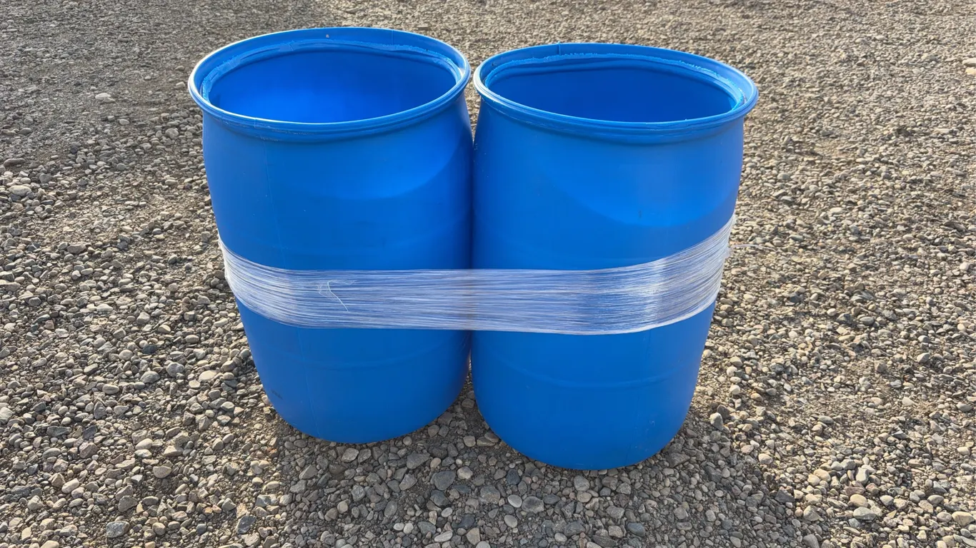 2 - 55 Gallon Plastic Rain Barrels