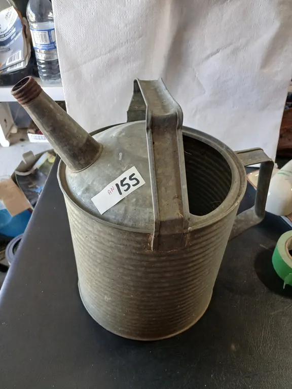 Galvanized water can