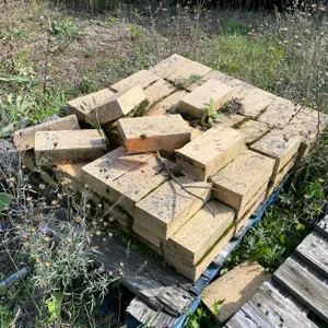 Pallet of Brick and Pallet of Concrete Blocks