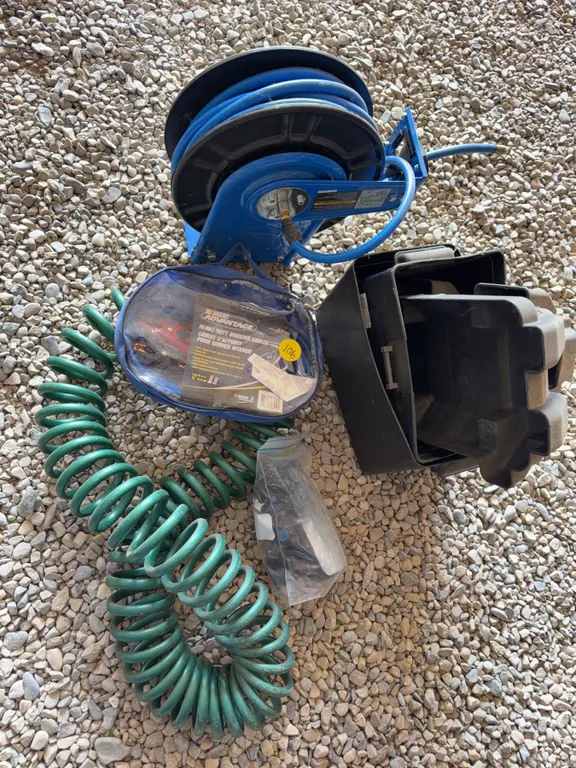 Mastercraft Air Hose Reel With battery covers, heavy duty booster cables, hoes and mirror