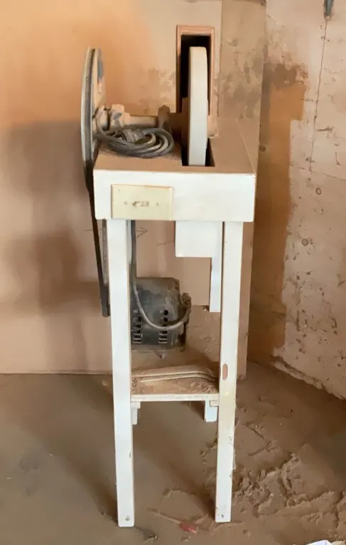 Bench Mounted Grinder with Electric Motor and Large Flywheel on Stand